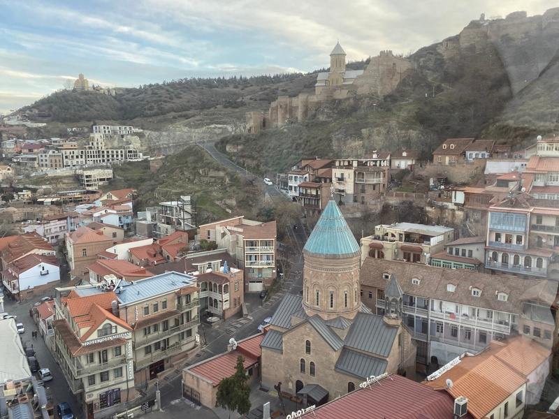 A group of children in front of a church