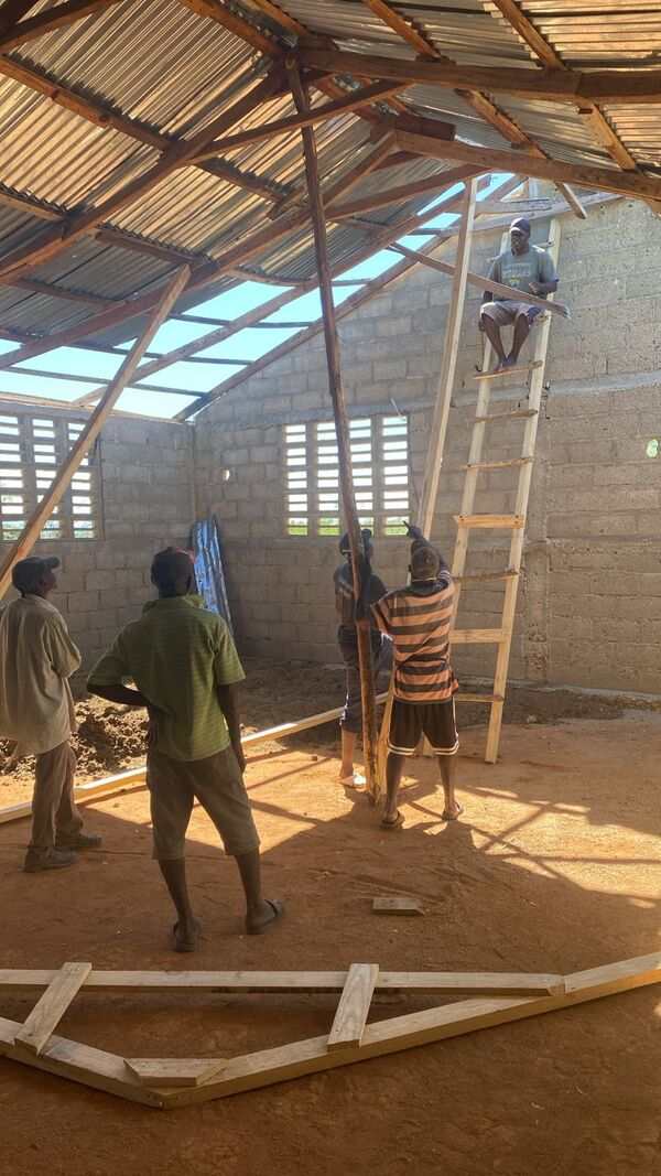 Men building a church in Haiti
